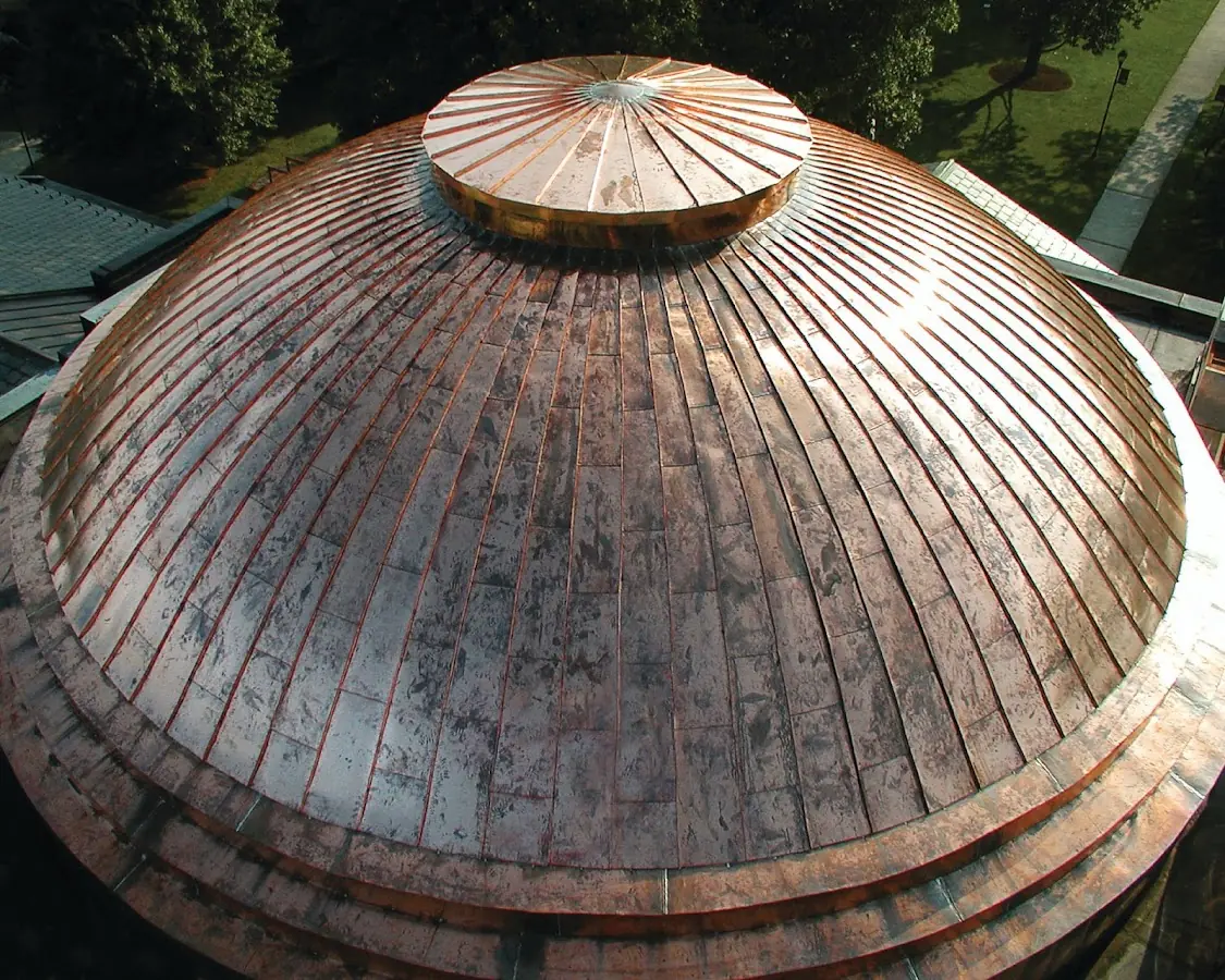 Craftsman Roofing crew installing a new roof in Gannett Corners